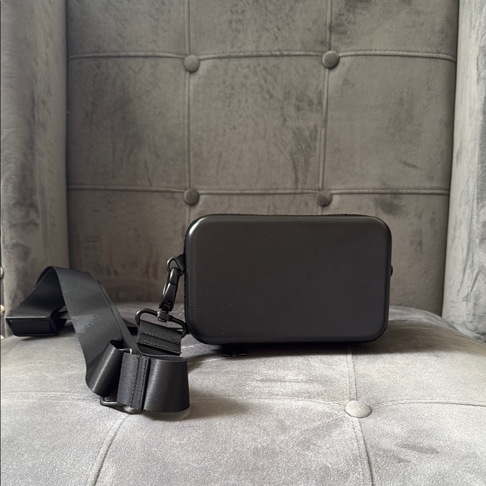 Sleek Black Hardshell Unisex Crossbody Bag
